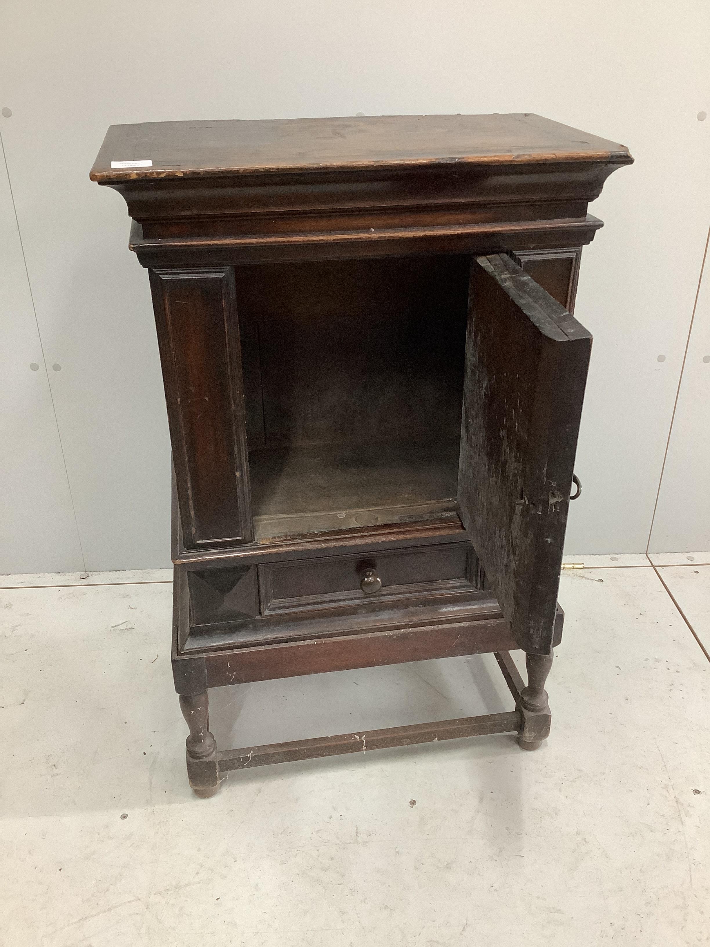 An 18th century oak spice cabinet, on later stand, width 58cm, depth 33cm, height 93cm